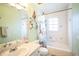 Bathroom with a tub/shower combo, single vanity, and ocean-themed decor at 5815 114Th N Ter, Pinellas Park, FL 33782