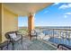 Spacious lanai with wicker furniture overlooking a marina at 606 Riviera Dunes Way # 404, Palmetto, FL 34221