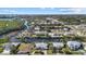 Aerial view showcasing waterfront property and canal at 609 Elba Dr, Nokomis, FL 34275