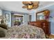 Bedroom with King bed and access to outdoor patio at 609 Elba Dr, Nokomis, FL 34275