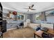 Bright bedroom with a twin bed, desk and built-in dresser at 609 Elba Dr, Nokomis, FL 34275