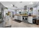 Modern kitchen with stainless steel appliances and ample cabinet space at 609 Elba Dr, Nokomis, FL 34275