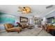 Bright and airy living room featuring comfortable furniture and a cozy atmosphere at 609 Elba Dr, Nokomis, FL 34275