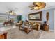 Open living space with ample natural light, comfortable furnishings, and a view at 609 Elba Dr, Nokomis, FL 34275