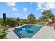 Inviting swimming pool with ample deck space for lounging at 609 Elba Dr, Nokomis, FL 34275