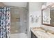 Clean bathroom with shower/tub combo and granite vanity at 6250 Holmes Blvd # 32, Holmes Beach, FL 34217