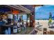 Charming tiki bar on the beach with ocean views, perfect for relaxing and enjoying the tropical vibes at 6250 Holmes Blvd # 32, Holmes Beach, FL 34217
