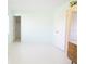 Bedroom with double door closet and neutral walls at 6887 Ketona Rd, North Port, FL 34287