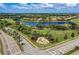 Community entrance and surrounding landscape at 7005 River Hammock Dr # 103, Bradenton, FL 34212