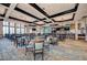 Bright dining room with large windows and bar area at 7005 River Hammock Dr # 103, Bradenton, FL 34212