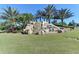 River Strand community entrance with waterfall at 7005 River Hammock Dr # 103, Bradenton, FL 34212