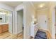 Bright condo hallway with light wood floors at 7005 River Hammock Dr # 103, Bradenton, FL 34212