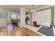 Home office with built in cabinets and view of kitchen at 7005 River Hammock Dr # 103, Bradenton, FL 34212