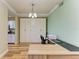 Home office with built in cabinets and kitchen access at 7005 River Hammock Dr # 103, Bradenton, FL 34212