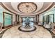 Upscale lobby featuring a water wall and seating at 7005 River Hammock Dr # 103, Bradenton, FL 34212