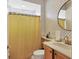 Clean bathroom with a shower/tub combo and updated vanity at 7416 Birds Eye Ter, Bradenton, FL 34203