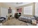 Well-lit bedroom with a large American flag and workspace at 7416 Birds Eye Ter, Bradenton, FL 34203