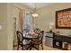 Bright breakfast nook with a round table and four chairs at 7416 Birds Eye Ter, Bradenton, FL 34203