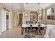 Elegant dining room with a farmhouse table and metal chairs at 7416 Birds Eye Ter, Bradenton, FL 34203