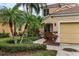 Front view of home with walkway and attached garage at 7416 Birds Eye Ter, Bradenton, FL 34203