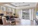 Relaxing living room with a view to the backyard at 7416 Birds Eye Ter, Bradenton, FL 34203
