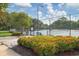 Well-maintained tennis courts with surrounding landscaping at 7416 Birds Eye Ter, Bradenton, FL 34203