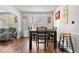 Bright dining area with hardwood floors and a four-person table at 766 13Th S Ave, St Petersburg, FL 33701