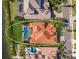 Bird's eye view of a home with a pool and a waterfront lot at 805 Riviera Dunes Way, Palmetto, FL 34221