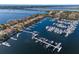 Aerial view of waterfront home and marina at 805 Riviera Dunes Way, Palmetto, FL 34221