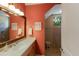 Simple bathroom with single vanity and walk in shower at 805 Riviera Dunes Way, Palmetto, FL 34221