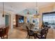 Bright Gathering room with water views and access to pool area at 805 Riviera Dunes Way, Palmetto, FL 34221