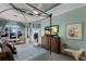 Main bedroom with water views and large ensuite bathroom at 805 Riviera Dunes Way, Palmetto, FL 34221