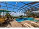 Resort-style pool with spa and plenty of lounge chairs at 805 Riviera Dunes Way, Palmetto, FL 34221