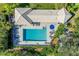 Aerial view of the community pool, hot tub and lounge area at 8412 Whispering Woods Ct, Lakewood Ranch, FL 34202