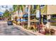 This commercial area features pedestrian-friendly sidewalks, outdoor seating, and a variety of shops and restaurants at 8412 Whispering Woods Ct, Lakewood Ranch, FL 34202