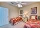 Bedroom with two twin beds and built in closet at 9351 Raes Creek Pl, Palmetto, FL 34221