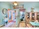 Bright dining room with glass-top table and decorative accents at 9351 Raes Creek Pl, Palmetto, FL 34221