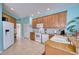 Kitchen with granite countertops and wood cabinets at 9351 Raes Creek Pl, Palmetto, FL 34221