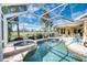 Spacious screened pool and spa with golf course view at 9351 Raes Creek Pl, Palmetto, FL 34221