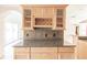 Kitchen with light wood cabinets, granite countertops, and wine rack at 1397 Harbor Dr, Sarasota, FL 34239