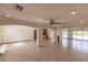 Large living area with tile floors, arched doorways, and high ceilings at 1397 Harbor Dr, Sarasota, FL 34239