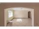Spacious living room with tile floors and large windows, under renovation at 1397 Harbor Dr, Sarasota, FL 34239
