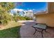 Brick patio and kidney-shaped pool in backyard at 1397 Harbor Dr, Sarasota, FL 34239
