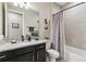 Clean bathroom with granite vanity and tub shower combo at 16714 Savory Mist Cir, Bradenton, FL 34211