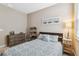 Serene bedroom with full-size bed and decorative accents at 16714 Savory Mist Cir, Bradenton, FL 34211