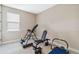 Home gym with inversion table and weight bench at 16714 Savory Mist Cir, Bradenton, FL 34211