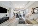Open concept living room with kitchen and dining area views at 16714 Savory Mist Cir, Bradenton, FL 34211