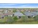 Community overview showcasing lakefront properties and a variety of home styles at 1724 Hyssop Loop, North Port, FL 34289