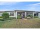 Covered patio with access from the house, perfect for outdoor relaxation and entertaining at 1724 Hyssop Loop, North Port, FL 34289