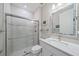 Clean bathroom with a walk-in shower and modern vanity at 1724 Hyssop Loop, North Port, FL 34289